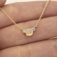 "14k Opal Diamond Necklace | 5.0MM Natural Opal Pendant | October Birthstone Necklace | Opal Charm | Real Gold Necklace | 14k Opal Necklace  P R O D U C T 𝄪 D E T A I L S ✽ October Birthstone. Delicate. Fiery. Magical. ✽ Metal: 14k Yellow Gold, White Gold & Rose Gold ✽ Chain Length: 14\" - 20\" (Classic Rolo Chain) ✽ Center Stone: 5.0 mm Natural Opal (approx. 0.5ct) ✽ This is Natural Opal. Each opal has different colors. ✽ Diamond Size: 2.0 mm x 2pcs (total 0.06ct) ✽ Diamond Color: G ✽ Diamond Opal Diamond Necklace, Opal And Diamond Necklace, Fine Jewelry Opal Round Necklaces, Gold Necklace With Round Cut Gemstone, Opal Round Pendant Necklace For Anniversary, Gold Opal Jewelry With Round Cut, Anniversary Opal Necklace With Round Pendant, Elegant Opal Clavicle Chain Jewelry, Opal Birthstone Necklace For Anniversary