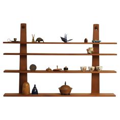 three wooden shelves with different items on them