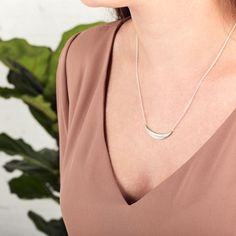 Silver Diamond Wisp Necklace by Corey Egan Elegant Everyday Half Moon Necklace, Elegant Half Moon Necklace, Minimalist Half Moon Necklace For Everyday, Everyday Minimalist Crescent Necklaces, Minimalist Crescent Necklaces For Everyday, Elegant Sterling Silver Half Moon Necklace, Elegant Silver Half Moon Necklace, Necklace Everyday, Crescent Necklace