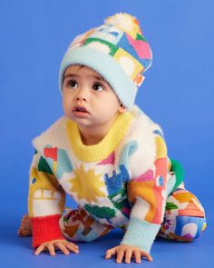 Snug as a bug! Nurture curious and creative young minds with this fluffy knit beanie for babies and kids.Features a folded up border, dreamy pom pom, and pictures knit from Halcyon Nights new collection on both sides.Machine washable. Holds its shape well so you can enjoy it time and time again. This item is a true keepsake.Soft breathable cotton / nylon blend.Castle Of Dreams motif illustration by Beci Orpin. Best Baby Bottles, Fluffy Knit, Pregnancy Pillow, Baby Swimming, Best Club, Sleep Sacks, Time And Time Again, A Hug