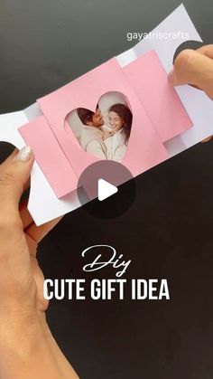 someone is holding up a card with the words diy cute gift idea