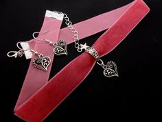 "This is a pretty hand made pink velvet choker necklace and earrings with a tibetan silver heart charm. The velvet is 16mm wide (approx one inch). Measures approx. 13\" long plus a 1.5 inch extension chain. If you would like a longer, or shorter length, let me know, and i'll make the size you want. Thanks for looking!" Pink Choker For Valentine's Day Gift, Vintage Choker As Valentine's Day Gift, Adjustable Wedding Choker For Valentine's Day, Vintage Choker Jewelry For Valentine's Day, Vintage Valentine's Day Choker, Vintage Heart Charm Choker Jewelry, Vintage Heart Charm Choker, Handmade Jewelry For Valentine's Day Party, Pink Heart-shaped Choker As A Gift