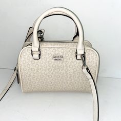 New Without Tags Unused Guess Purse. Purse Dimensions: 9.5” Wide, 7” Tall, 4” Deep White Spring Satchel With Top Carry Handle, Spring White Satchel With Top Carry Handle, Guess Purse, Flower Handbag, Guess Purses, Guess Handbags, Guess Bags, Pink Handbags, Light Rose