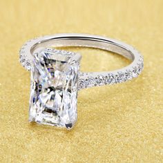 Emilia 3.5ct Elongated Radiant-cut Moissanite Diamond Bridge Hidden Halo Cathedral Style Engagement ring in 14K or 18K Gold by Earthena Jewelry Elongated Radiant, Weddings Ring, Hidden Halo Ring, Cathedral Setting, Big Diamond, Ring Displays, Radiant Cut Diamond, Creating Jewelry, Hidden Halo