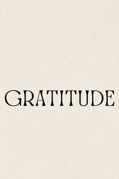 the word gratitude written in black on a white background