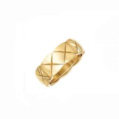 a gold ring on a white background