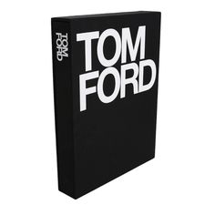 a black book with the words tom ford printed on it's front and back cover