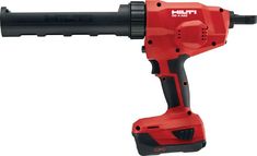 a red and black cordless drill on a white background