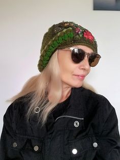 Green Wool Beanie Hat for Women Floral Embroidered Warm Slouchy Beanie This green embroidered beanie hat is designed and handmade by me. The wool crochet beanie is made of very soft olive green angora wool yarns, floral patches,sequins fabric,Preciosa glass beads. Hat trim circumference: About 61 cm/ 24 inches This winter boho woman beanie is very lightweight,stretchy and comfortable!Machine wash on a gentle program. This unique handmade hat could be your jewelry, fashion accessory and stylish a Green One Size Beanie, Green Adjustable Crochet Beanie, Green Yarn Beanie Cap, Green Hand Knitted Beanie One Size, Green Crochet Beanie Hat, One Size, Green Hand Knitted One Size Beanie, Hand Knitted Green Beanie One Size, Handmade Green Crochet Hat For Winter, Green One Size Beanie Crochet Hat