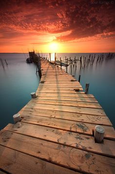 a dock with the words if you don't like something, change it, if you can't change it, change your attitude