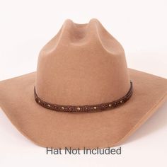 Description - One Size Fits All - Leather The Sonoma Hat Band is the perfect finishing touch to any cowboy hat. It's made of durable, high-quality materials that will last for years. The band is a rich brown color with beautiful bronze studs. The detailed design is eye-catching and unique. **Please note this is the hatband only** Shipping and Returns Orders generally arrive within 3-7 business days. All our hats come with a lifetime warranty. What this means is that even if you bought a hat over Luxury Custom Brown Hat Bands, Cheap Classic Hat Band For Spring, Cowboy Hat Band, Cowboy Hat Bands, American Hat Makers, 50 Years Ago, Detailed Design, Hat Band, Cowboy Hat