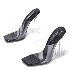 The Easy-To-Wear Look Of These Bold Heels Is Accentuated With Clear Strap, Sandal Heel Acrylic Heel Clear Strap Slip On Entry Colors: Black Sizes: (5.5)-(6)-(6.5)-(7)-(7.5)-(8)-(8.5)-(9)-(10) Black Heels With Transparent Straps For Summer, Black Heels With Transparent Straps, Black Sandals With Clear Strap For Party, Black High Heel Sandals With Clear Strap, Party Sandals With Clear Strap In Black, Trendy Formal Heels With Translucent Outsole, Chic Black Sandals With Translucent Outsole, Black Open Toe Heels With Translucent Outsole, Black Heels With Translucent Outsole For Party