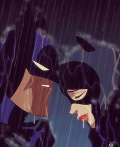 batman and catwoman kissing in the rain