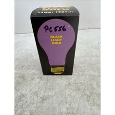 a black and purple light bulb box on the floor with its lid open to show it's logo