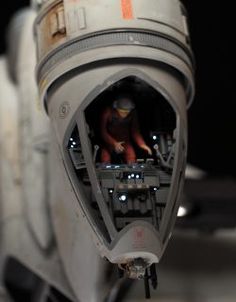 a close up view of the inside of a star wars vehicle with its lights on