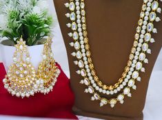 Kundan Bridal Choker Necklace Earrings Tikka Set, Long Necklace Rani Haar Pearls Bollywood Jewellery Set, Party Wear Necklace, Statement Set ITEM DESCRIPTION Metal = Gold Plated Occasion = Wedding, Party Wear, Bridal Color = White and Yellow Long Necklace = 13 Inches Long ( Adjustable String/Dori), Earring Size = 3.5 Inches Long, tikka - 6 Inches Long Free Shipping White Necklace For Party And Festivals, White Jewelry For Party And Festivals, White Necklace For Party And Festive Occasions, Festive White Necklace For Party, White Party Necklace For Festive Occasions, Rani Har, Purple Choker, String Earrings, Kundan Jewellery Bridal