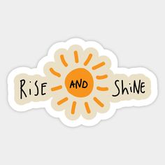 an orange and white sticker with the words rise and shine in black lettering on it