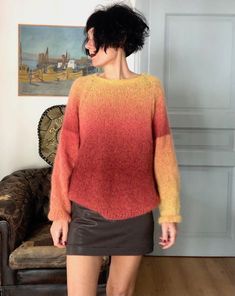 "I made this knit sweater for women using a soft and warm mohair yarn faded from yellow to brick red. This fluffy mohair alpaca knitted jumper is easily combined with jeans for a casual style, or if you prefer something more elegant you can wear it with a long skirt and boots. The gradient color of this crewneck hand knit mohair Sweater make it a precious piece to keep you comfortable and warm during autumn and winter. This soft wool knitted jumper mohair for winter  is a unique piece, the size fits S, M and L. For smaller women it will be a comfortable oversized garment. Here are the measurements of this knitted sweater: Breast                                        120 cm / 47\"24` Hem                                           120 cm / 47\"24` Length Long Skirt And Boots, Knit Mohair Sweater, Jumper Women, Knit Sweater Women, Mohair Jumpers, Handmade Sweater, Mohair Knit, Mohair Yarn, Knit Alpaca