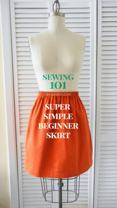 an orange skirt on a mannequin with the words sewing 101 super simple beginner skirt