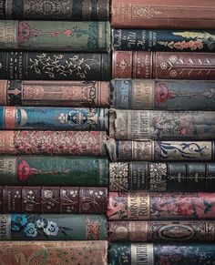 a stack of old books sitting next to each other