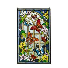 a stained glass window with flowers and butterflies on it's side, against a white background