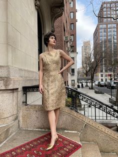 "60's brocade gold sleeveless dress by Selina, boat neck, wide band, zipper in the back, floral pattern, little slip on the bottom, lined. Size S, shoulders 13.5\", bust 16\", waist 13.5\", hip 18.5\", length 38\", zipper 19.5\" good vintage condition . Etsy Shipping Please read -Vintage and pre-owned items may have signs of wear and use and are offered as is. Traces of age and use are therefore completely normal and do not constitute defects. Please see pictures as they are part of the item des Gold Sleeveless Formal Dress, Gold Sleeveless Dress For Formal Occasion, Gold Silk Dress With Fitted Bodice, Gold Silk Fitted Dress, Gold Silk Dress With Sequins, Fitted Gold Silk Dress, Gold Sleeveless Silk Dress, Gold Knee-length Dress For Gala, Gold Brocade Dress For Gala