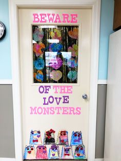 there is a door decorated with pink and blue decorations