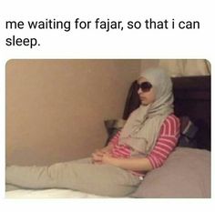 a woman sitting on top of a bed wearing a hijab and sunglasses with the caption me waiting for far, so that i can sleep