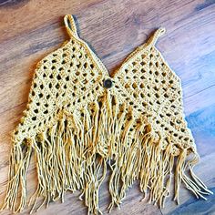 An adorable child boho vest to spice up any outfit. Sleeveless Cotton Crochet Top For Fall, Bohemian Brown Vest Top, Brown Sleeveless Hippie Top, Hippie Crochet Top For Fall, Bohemian Crochet Top For Fall, Fitted Bohemian Crochet Top For Fall, Brown Hippie Festival Tops, Fitted Bohemian Brown Crop Top, Brown Sleeveless Top For Festival