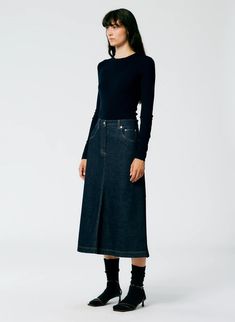 Crafted from the Indigo Denim finish, the Indigo Denim Midi Aline Skirt is the ultimate sartorial savior this season. Pair back to a simple turtleneck or navy shirting for a monochromatic look this season. This skirt is a mid-rise with a full bottom. It sits just below the waist and above the high hip. 100% Cotton Denim Midi Skirt Outfit, Denim Skirt Outfits, Aline Skirt, Indigo Denim, Denim Midi Skirt, Create Space, Dark Denim, Skirt Outfits, Cotton Style