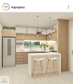 a kitchen with two stools in front of the counter and refrigerator freezer next to it