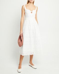 Price Comparison Few Moda $69 STAUD $325 Reformation $278 Product Details The Tomi Dress features a delicate white eyelet lace and a unique neckline with a keyhole detail, creating a charming and elegant look. Finished with a full and flouncy skirt for optimized frolicking. - Back zipper- Lining- Content: 100% Cotton Style# T23WDR09301 Fit Notes - Model wearing a size 2 - Model measurements: 5'10'' Height / 32'' Bust / 24'' Waist / 34'' Hips- Garment measurements: Size Length Bust Waist 0 102.55 Athena Dresses, White Hot, White Eyelet, Price Comparison, Eyelet Lace, Prom Party Dresses, Cotton Style, Cotton Dress, Dresses Xs