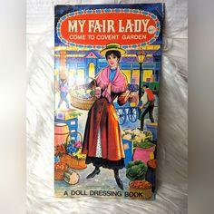 a book cover with an image of a woman holding a basket in front of her