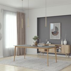 a living room scene with focus on the dining table and chairs, along with an area rug