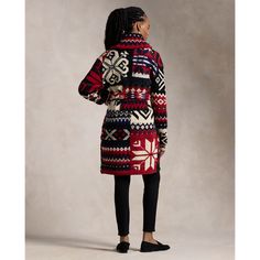 Crafted with a soft blend of yarns including wool linen and cotton this shawl-collar cardigan features an intarsia- and jacquard-knit snowflake motif. The relaxed wrap silhouette is finished with a self-belt at the waist.