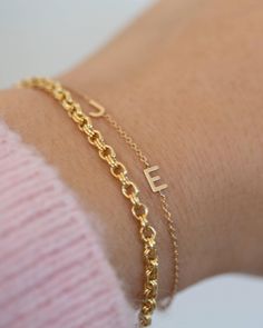 Gold double round cable chain bracelet Perfect everyday bracelet that has a good weight to it. You can wear it alone to create a simple sophisticated look or layer it with other bracelets to create a arm stack. Chain Width : 2.6mm Material: Gold filled For the initial bracelet shown in sample picture you can find it here: https://www.etsy.com/listing/641552304/perfect-bracelet-git-for-valentines-day?click_key=ee3776c94cf886b4b336575a39b05e8626044ddd%3A641552304&click_sum=21f15ce6&ref=shop_home_active_5&frs=1&sts=1 Formal Gold-tone Gold Bracelet With Cable Chain, Elegant Double Chain Gold-tone Bracelets, Formal Yellow Gold Rope Chain Bracelet, Elegant Brass Gold-tone Chain Bracelet, Heart-shaped Gold Chain Bracelet For Valentine's Day, Arm Stack, Everyday Bracelet, Bracelet Initial, Diamond Free