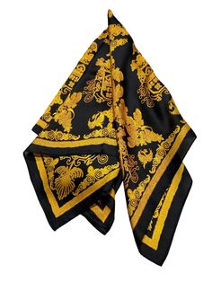 The Tuscan Sun Silk-Blend Scarf - Black & Gold - Unveil a world of mystery and sophistication with The Tuscan Sun Silk-Blend Scarf. This striking accessory combines deep black silk with rich gold accents, creating a dramatic contrast that exudes timeless elegance. The intricate pattern, reminiscent of ancient symbols or a hidden seal, evokes a sense of intrigue and allure, suggesting a captivating origin steeped in history. Whether draped around your neck or styled as a statement piece, this sca Luxury Silk Handkerchiefs For Business, Silk Neck Scarf, Silk Bandana, Yellow Scarf, Head Wrap Scarf, Silky Scarf, Scarf Men, Head And Neck, Neck Scarves