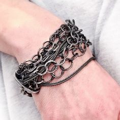 Chunky Chain Bracelet, Multi Strand Chain Bracelet, Chainmaille Silver Bracelet, Oxidized Silver Bracelet A true statement bracelet, very noticeable and comfortable to wear. The oxidized silver creates a rustic look with a Rock&roll twist. It has an edgy yet organic feel. Details - *. 925 Sterling Silver *. Brushed oxidized finish *. Average length: 8.10 inch *. Width: Approximately 1.00 inch Each my jewelry is made by hand and therefore there are no two alike. As it is custom made, height a Oxidized Silver Bracelet, Rock Amp, Multi Strand Bracelet, Statement Bracelet, Bracelet Collection, Oxidized Silver, Braided Bracelets, A Rock, Multi Strand