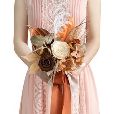 a bridesmaid holding a bouquet of flowers and leaves in her hands on a white background