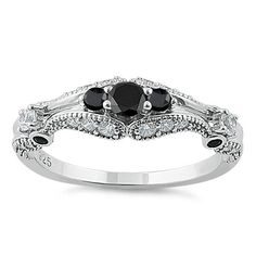 Top of ring height: 6mm

        Band width:  1.9mm

      Shank width: 1.6mm

    
        Stone material:  black & clear cubic zirconia

      Center stone size: 3.2mm

      Stone shape:  round

      Center stone carat    weight: .14 ct.

      Total number of stones: 29

      Stone setting: prong setting

   
       Metal:  925 sterling silver

      Plating: rhodium plated    (what is rhodium?) What is Rhodium? 
 
   If you're not familiar with Rhodium, it's a rare metal in Black Diamond Ring With Accent Stones, Classic Black Rings With Accent Stones, Black Diamond Rings With Accent Stones, Formal Black Cubic Zirconia Diamond Ring, Formal Black Cubic Zirconia Ring, Classic Black Diamond Ring With Brilliant Cut, Black Cubic Zirconia Rings For Anniversary, Black Cubic Zirconia Anniversary Rings, Classic Rings With Black Diamonds And Cubic Zirconia