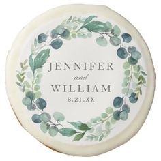 a personalized soap bar with an olive wreath on the front and green leaves around it