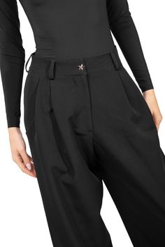 A soft pant with a masculine style reinterpreted for women, featuring structured yet feminine lines that combine elegance and comfort, creating an androgynous and sophisticated look.
The star-shaped button becomes the elegant standout detail, giving the look a bold character that highlights the balance between the two styles, emphasizing the versatility of the garment.
Innovative features, such as the high-performance techno-fabric, provide comfort and flexibility, naturally adapting to the bod Modern Wide Leg Pants With Belt Loops, Modern Bottoms With Button Closure, Elegant Pants With Button Closure For Night Out, Masculine Style, Soft Pants, Matching Top, Tops For Leggings, Star Shape, Workout Tops