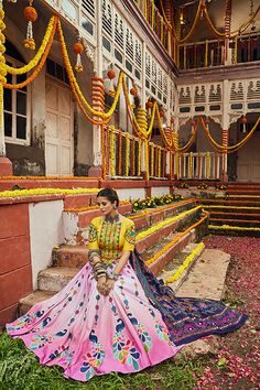 Shubhkala Pink Maslin Cotton Digital Printed Mirror Pasting Navratri Lehenga This beautiful Shubhkala Navratri Lehenga is designed to add a touch of elegance to your festive wardrobe. The lehenga features intricate digital prints and mirror pasting that enhances its visual appeal. Made from high-quality Maslin cotton, it ensures comfort and style for your celebrations. Key Features Elegant pink color with digital printed design Mirror pasting details for a sparkling look Perfect for Navratri and