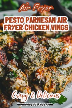 chicken wings with pesto parmesan on top and text overlay that reads, air fryer pesto parmesan air fryer chicken wings crispy & delicious