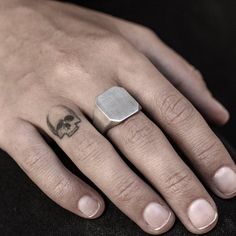 A handmade sterling silver 925 blank octagon signet stamp ring.Each ring is cleaned and polished with care.The weight of the ring may vary according to size.Top measurements: Width - 14.5mm | Height - 16.5mmApprox weight: 9.18grThe ring is made of sterling silver 925 and is water resistant.This awesome signet ring is available in more shapes! Click here to see:Rectangle: https://www.etsy.com/il-en/listing/543815352/rectangle-sterling-silver-signet-ringRound: https://www.etsy.com/il-en/listing/54 Rectangle Signet Ring, Signet Ring Silver, Stamp Ring, Personalized Initial Ring, Ring Rectangle, Stamped Rings, Top Measurements, Silver Signet Ring, Skull Bracelet