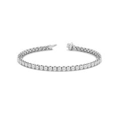 A tennis bracelet displaying a pared-back yet bold aesthetic. This piece features a continuous line of round diamonds set in a decorative tulip basket. This sparkly and elegant piece comes with that little bit of extra style to distinguish itself from the rest. Tulip Basket, Bold Aesthetic, Round Diamond Setting, Bracelet Display, Gorgeous Engagement Ring, Diamond Tennis Bracelet, Continuous Line, Tennis Bracelet Diamond, Now And Forever