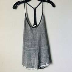 Free People Gray T Strap Burnout Tank Top Sz Xs B-Lb Color: Gray Description: Stretch Fabric: Linen Rayon Approximate Across Measurement: Bust 22" Length 28" Great Condition Smoke Free Pet Free Storage Relaxed Fit Gray Top For Beach, Gray Cotton Tank Top For Sports, Gray Summer Workout Top, Gray Workout Top For Summer, Gray Stretch Racerback Top, Gray Scoop Neck Tank Top For Summer, Gray Scoop Neck Top For Workout, Casual Gray Scoop Neck Top, Casual Gray Tank Top