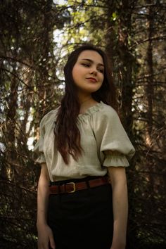 Step back in time with this exquisite natural cotton chemise top. Reminiscent of the medieval era, this beige medieval shirt is perfect for adding a touch of historical flair to your wardrobe or for larp costume. With puff sleeves and a delicate linen type fabric, this Renaissance blouse is a true standout piece, perfect for channeling your inner pagan or witchy vibes. Embrace the magic of the past with this enchanting top. Perfect for costume parties, Renaissance fairs, or simply adding a touch Cotton Peasant Top With Bishop Sleeves, Beige Cotton Peasant Top, Cottagecore Puff Sleeve Peasant Top, Bohemian Puff Sleeve Tops For Gatherings, Bohemian Cotton Peasant Top With Puff Sleeves, Beige Peasant Cotton Blouse, Fall Peasant Blouse With Short Sleeves, Cotton Peasant Top For Gatherings, Fall Peasant Top With Puff Sleeves