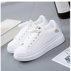 White Round Toe Canvas Shoes, Trendy Flat Skate Shoes With White Sole, Casual Flat Sneakers With White Sole, Trendy White Slip-on Platform Sneakers, Trendy White Flat Skate Shoes, Spring Sporty Flat Skate Shoes, Trendy Slip-on Skate Shoes, Trendy Canvas Shoes With Vulcanized Sole, Trendy Flat Canvas Shoes With Vulcanized Sole