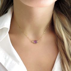 "I love the soft purple in this suspended amethyst necklace! It's hung on a 14k gold filled chain - a perfect gift for the amethyst lover! it's in the DETAILS . . . » Genuine amethyst gemstone » 14k gold filled chain it's in the OPTIONS . . . » Choose your length. The model is wearing this necklace at 14\" but she is petite and neck sizes vary greatly, like pant sizes. Please measure or order an extender if you're unsure of length! https://www.etsy.com/listing/235190064/gold-chain-extender-two-i Amethyst Pendant Birthstone Necklace, Purple Necklace With Gemstone Accents As Gift, Amethyst Crystal Necklace With Adjustable Chain As Gift, Dainty Lavender Amethyst Jewelry, Purple Gemstone Pendant Birthstone Necklace, Amethyst Gemstone Crystal Necklace, Amethyst Crystal Necklace For Healing, Purple Amethyst Necklace With Gemstone Accents, Purple Amethyst Birthstone Necklace